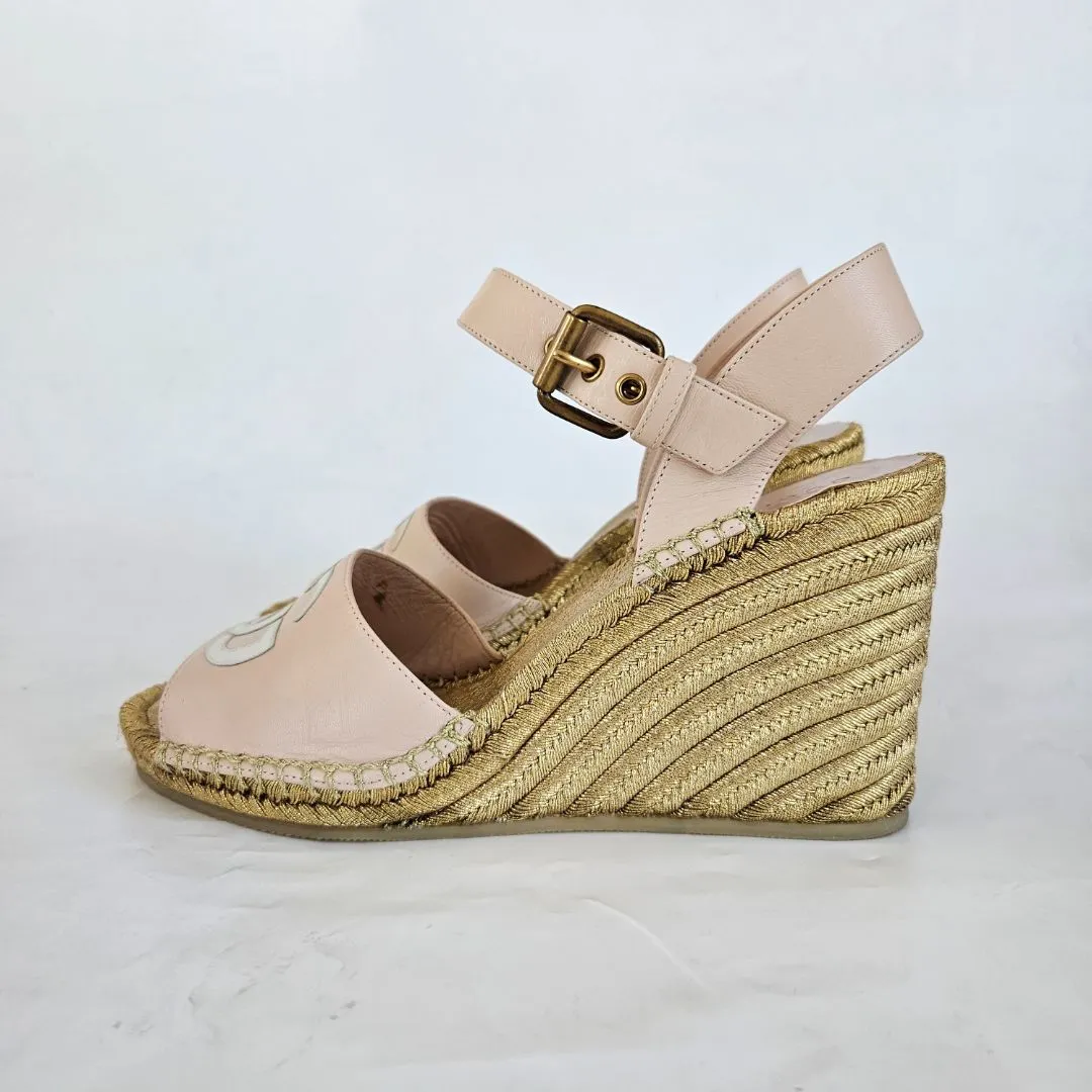 Gucci Leather wedge espadrilles, metallic-finish jute wedge, 38.5