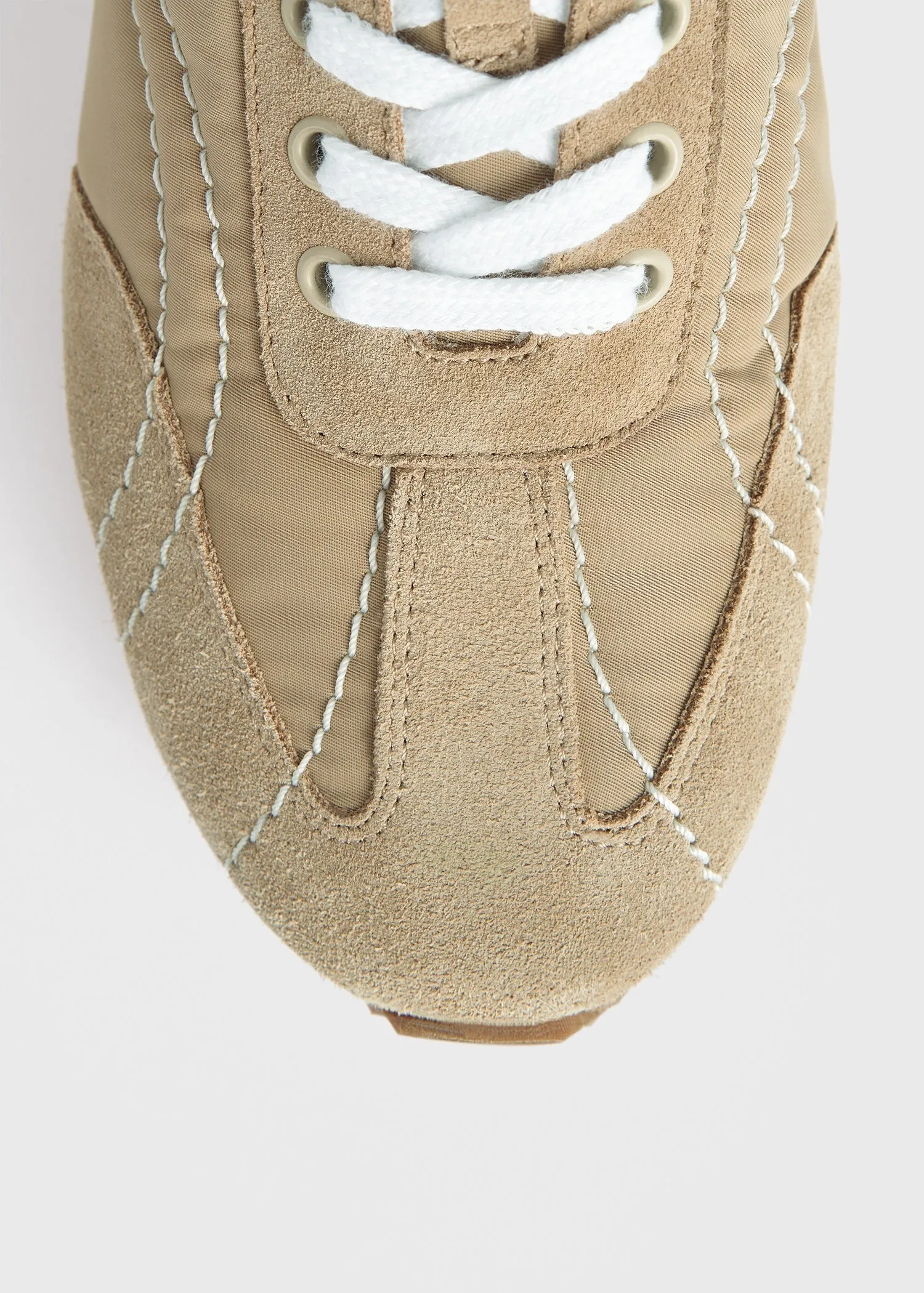 Sport sneakers sand